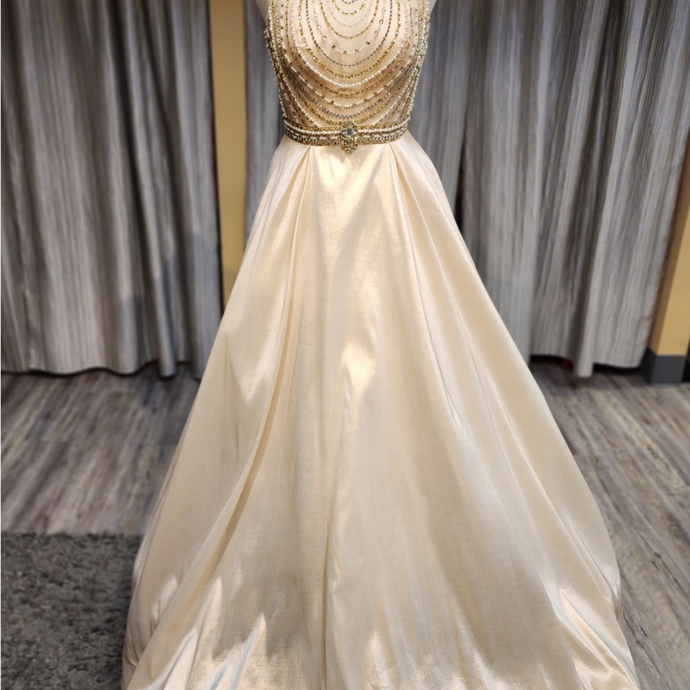 Gold satin high neck with pearl embellishment on bodice with pockets